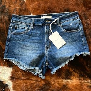 Kancan cutoff Jean shorts 65% cotton 33% rayon and 2% spandex